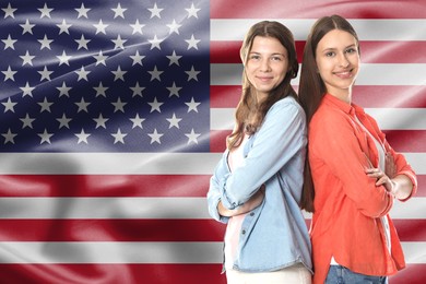 Image of Happy students against flag of USA. Language school