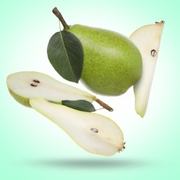 Image of Fresh green pears flying in air on turquoise background