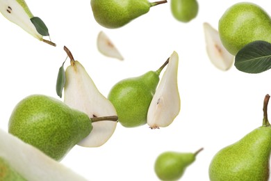 Image of Fresh green pears flying in air on white background