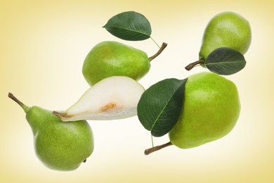 Image of Fresh green pears flying in air on pale orange background
