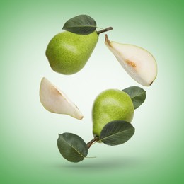 Image of Fresh green pears flying in air on color background