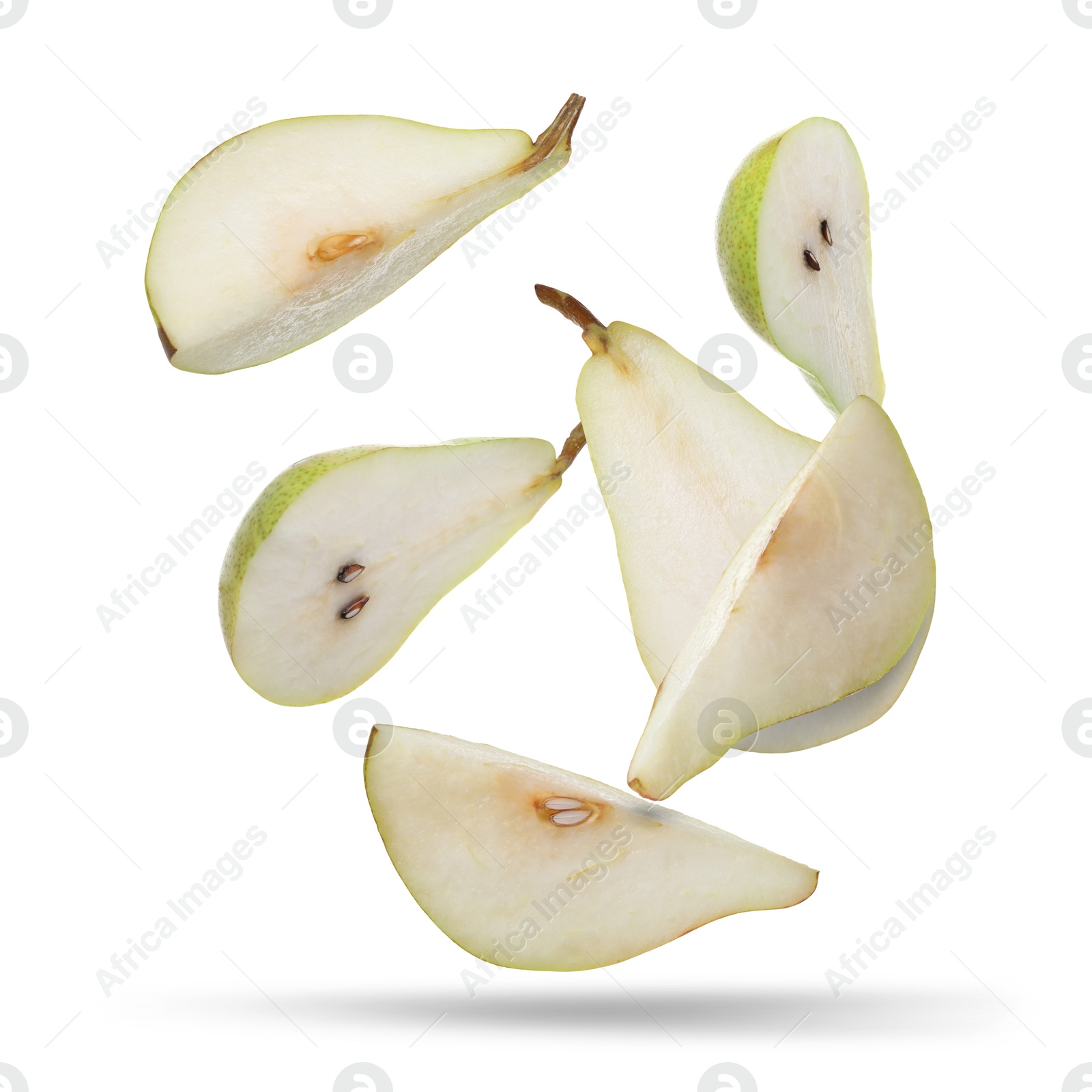 Image of Slices of green pears flying in air on white background