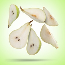 Image of Slices of green pears flying in air on color background