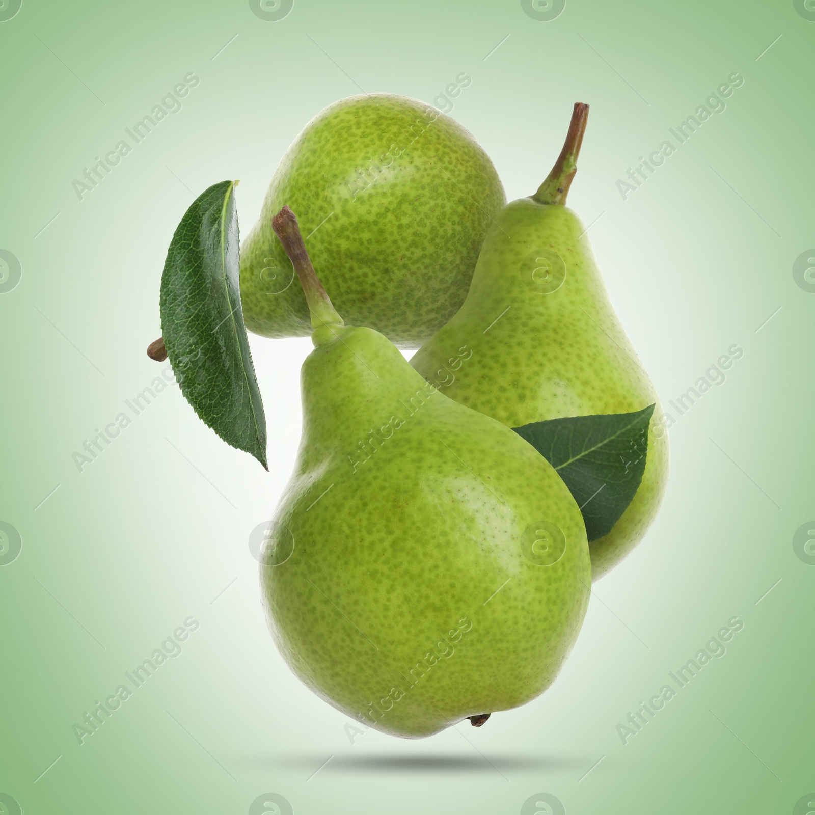 Image of Fresh green pears flying in air on color background