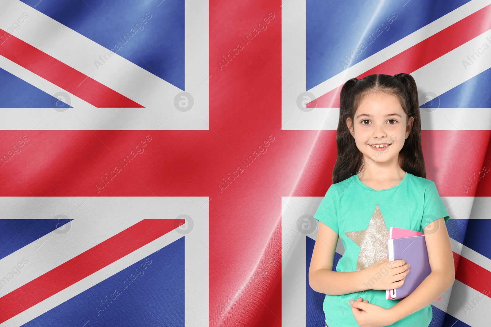 Image of Little girl with notebooks against flag of United Kingdom. Language school