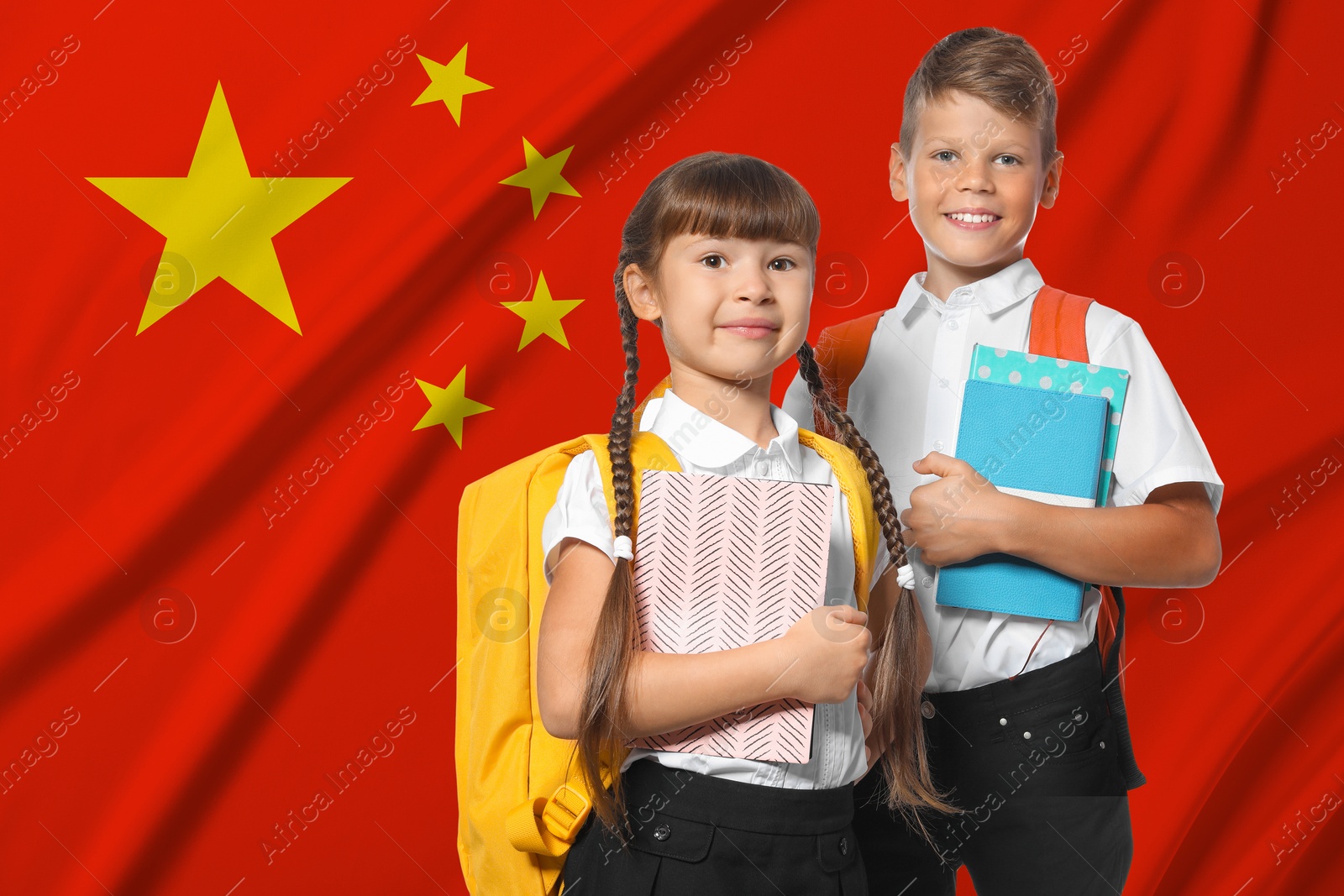 Image of Children with backpacks and notebooks against flag of China. Language school