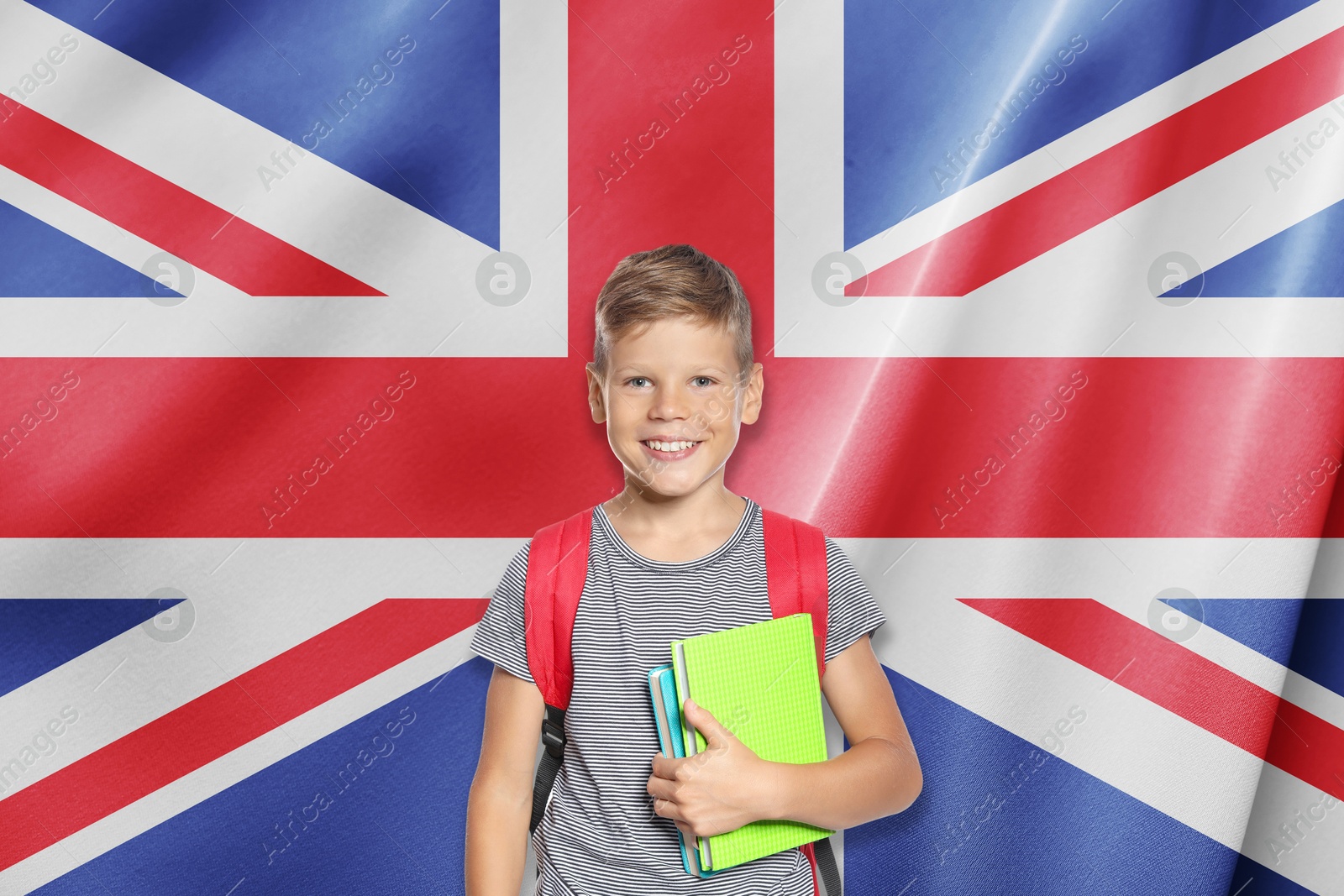 Image of Little boy with backpack against flag of United Kingdom. Language school