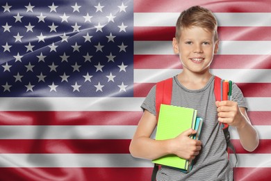 Image of Little boy with backpack and stationery against flag of USA. Language school