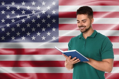 Image of Student or teacher with book against flag of USA. Language school