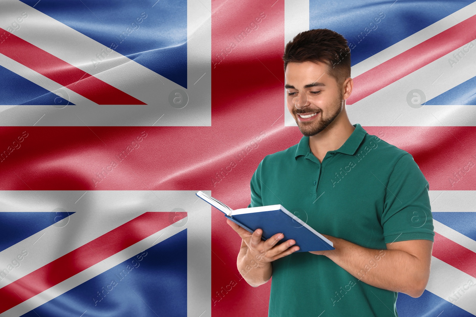 Student or teacher with book against flag of United Kingdom. Language school Image of Student or teacher with book against flag of United Kingdom. Language school
