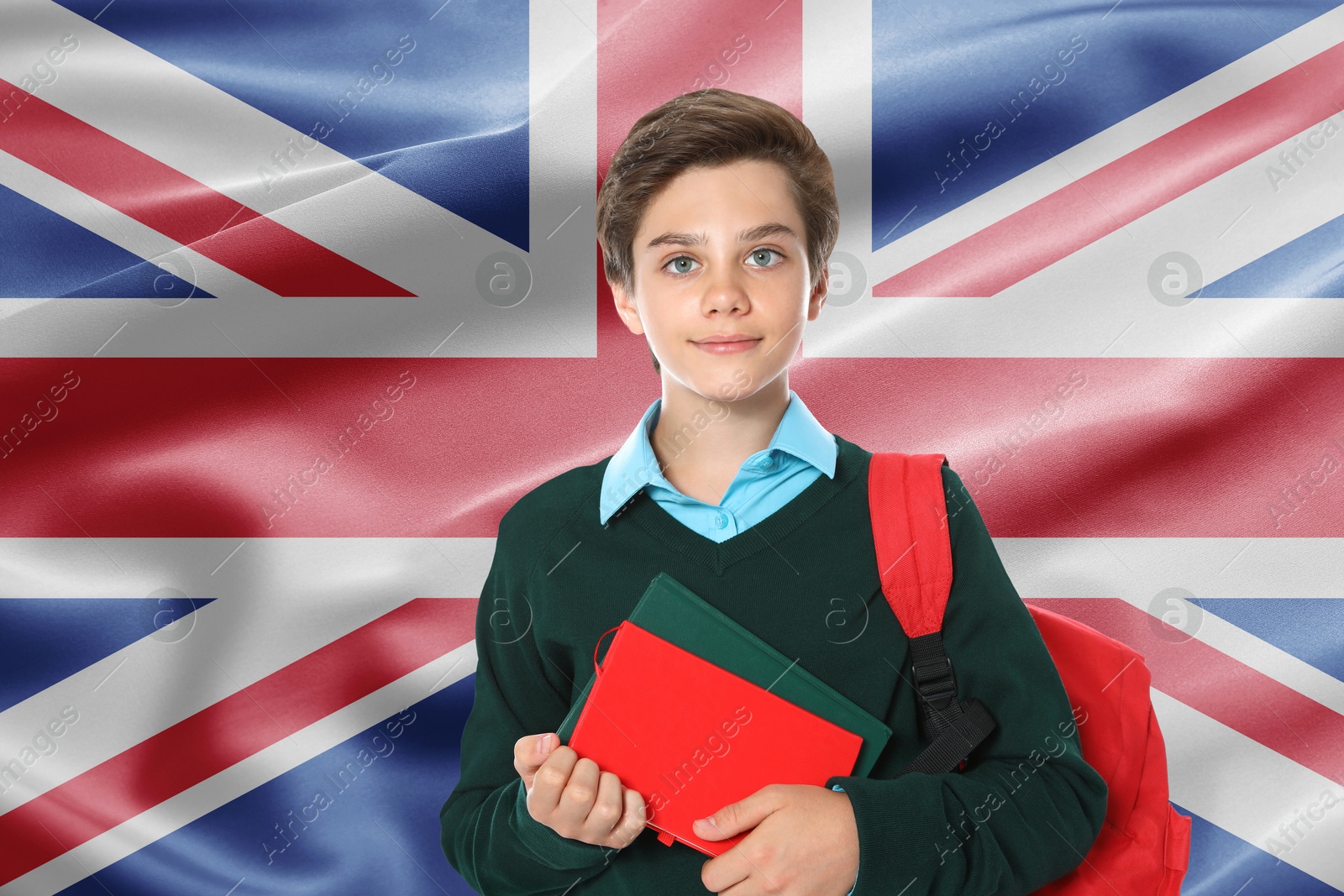 Image of Student with backpack and notebooks against flag of United Kingdom. Language school