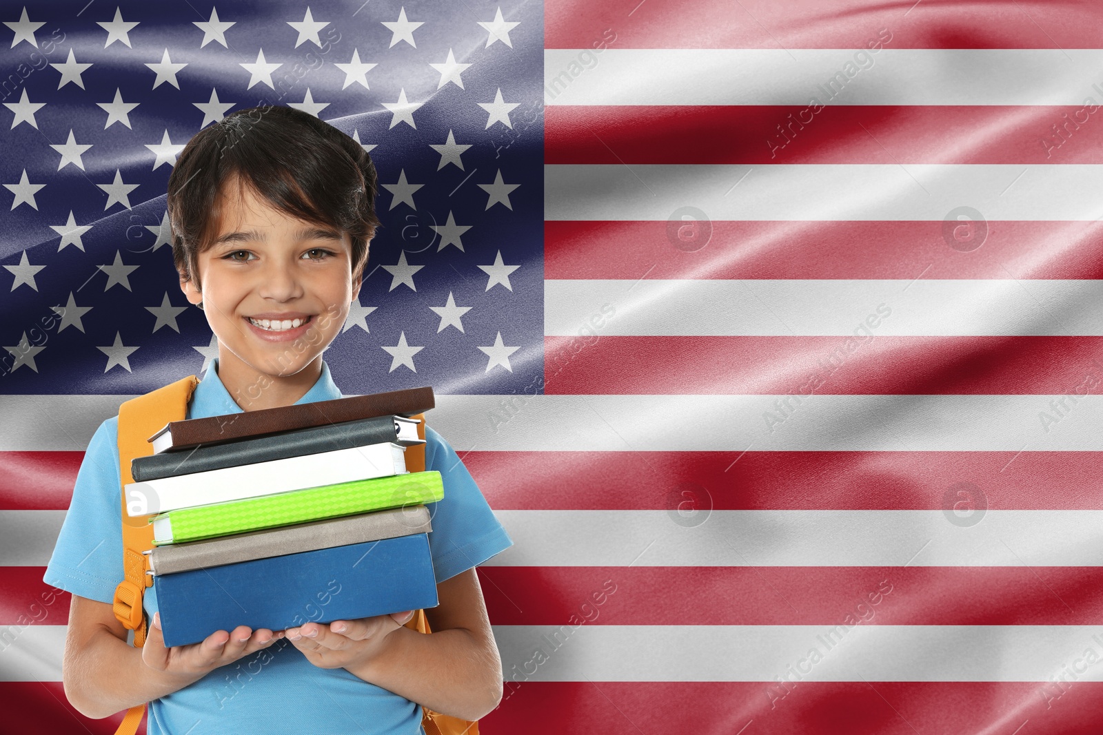 Image of Little boy with books against flag of USA. Language school
