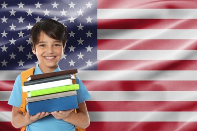 Image of Little boy with books against flag of USA. Language school