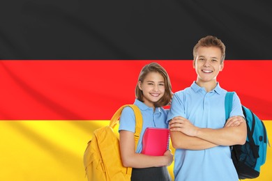Image of Students with backpacks against flag of Germany. Language school