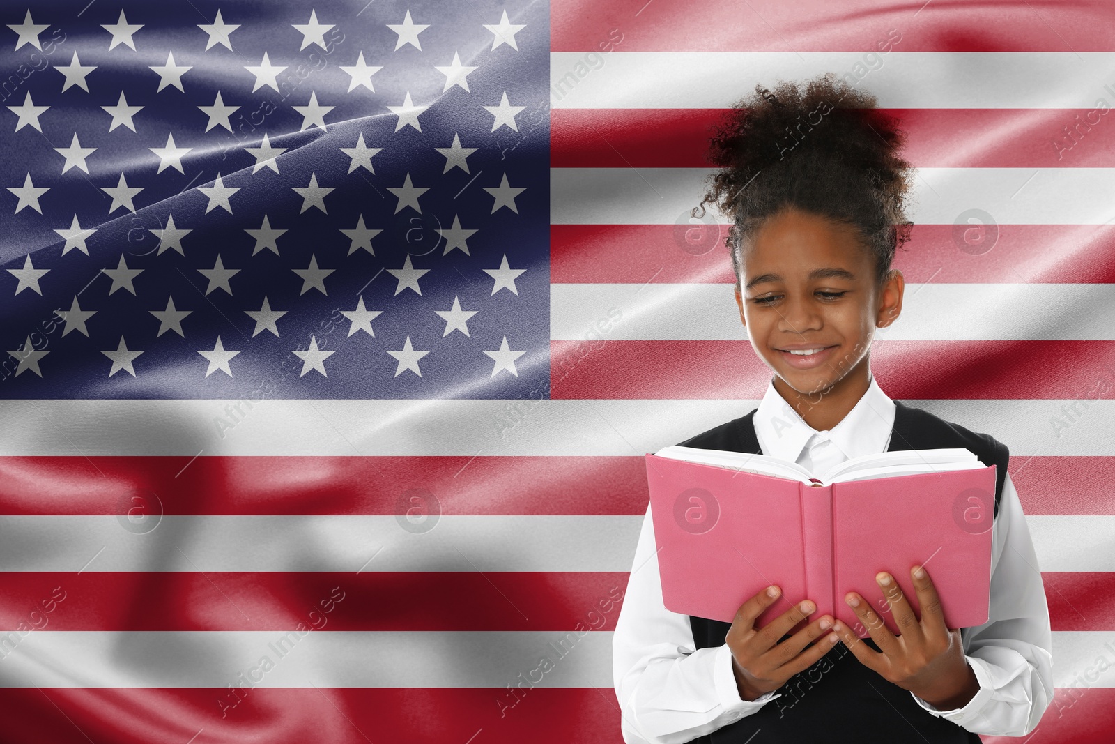 Image of Little girl with book against flag of USA. Language school