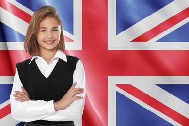 Image of Happy student against flag of United Kingdom. Language school