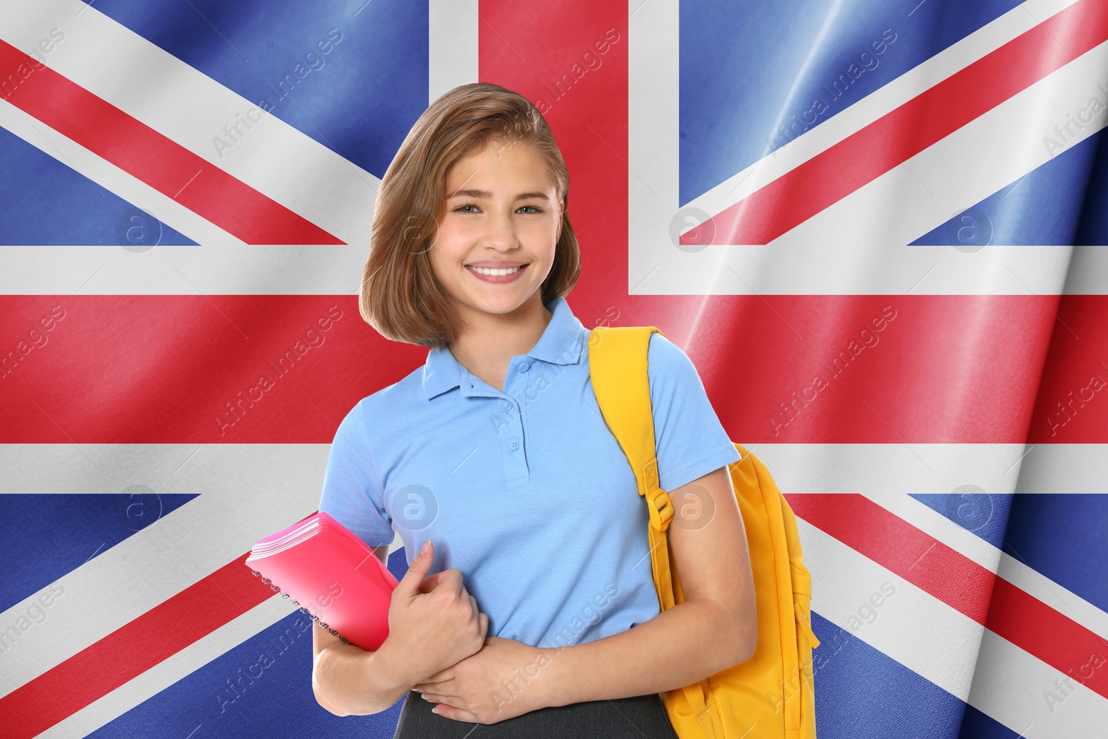 Image of Happy student with backpack and notebook against flag of United Kingdom. Language school