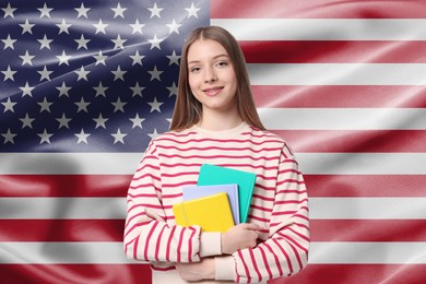 Image of Student with notebooks against flag of USA. Language school