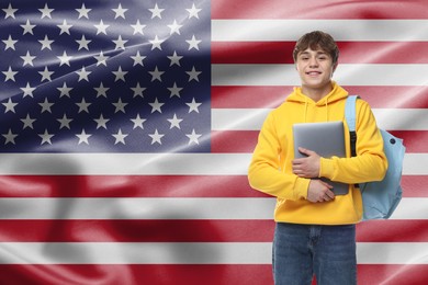 Image of Student with laptop and backpack against flag of USA. Language school
