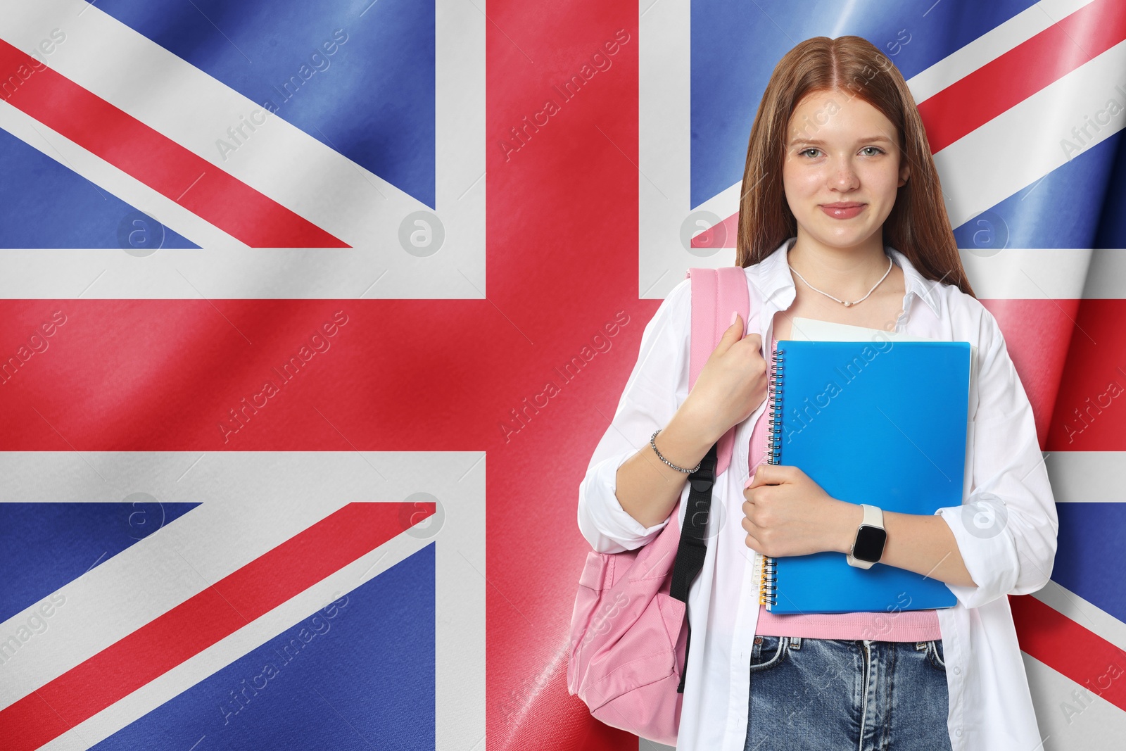 Image of Student with notebook and backpack against flag of United Kingdom. Language school