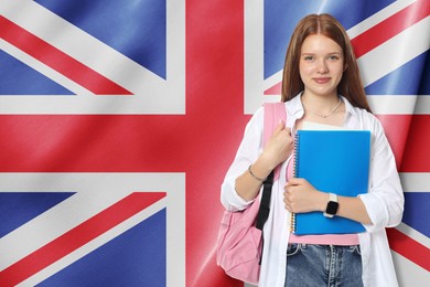 Image of Student with notebook and backpack against flag of United Kingdom. Language school