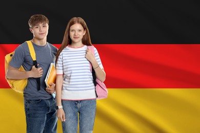 Image of Students with backpacks against flag of Germany. Language school