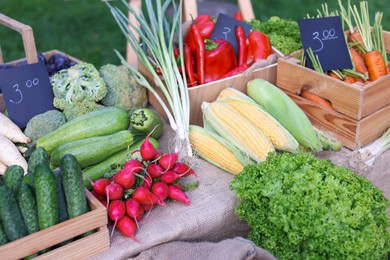 Photo of Many different vegetables on stall at farmer's market, closeup