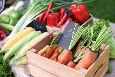 Photo of Many different vegetables on stall at farmer's market, closeup