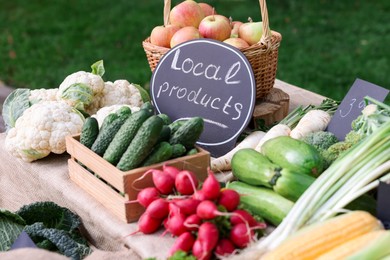 Photo of Many different vegetables on stall at farmer's market, closeup