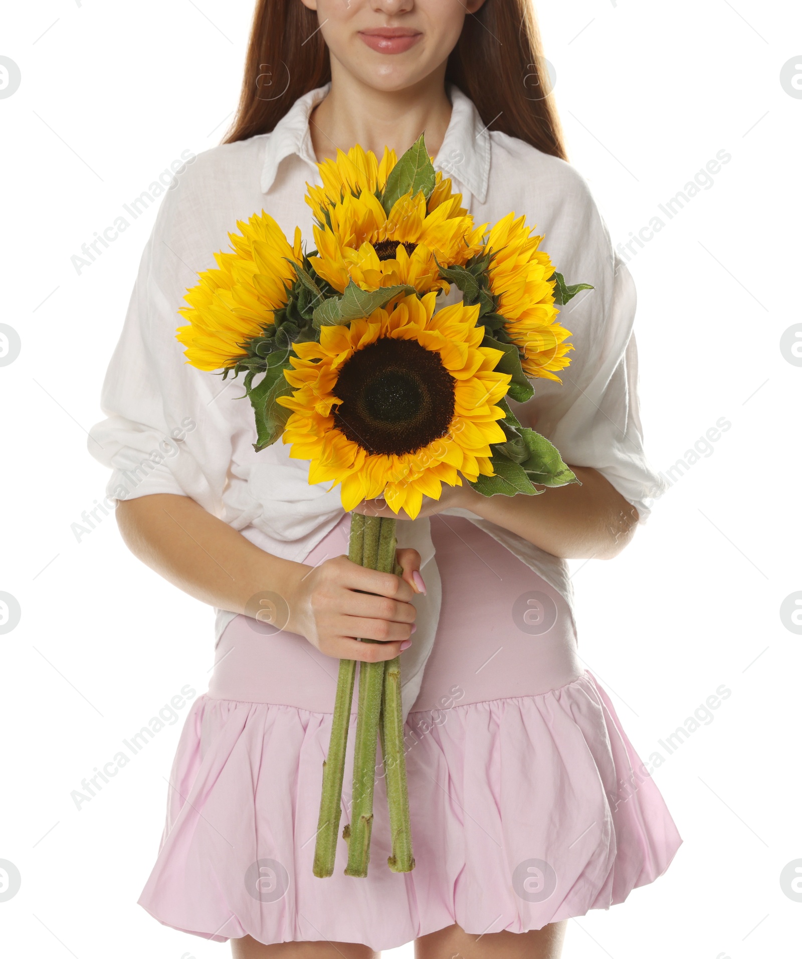 Photo of Teenage girl with bouquet of beautiful sunflowers on white background, closeup