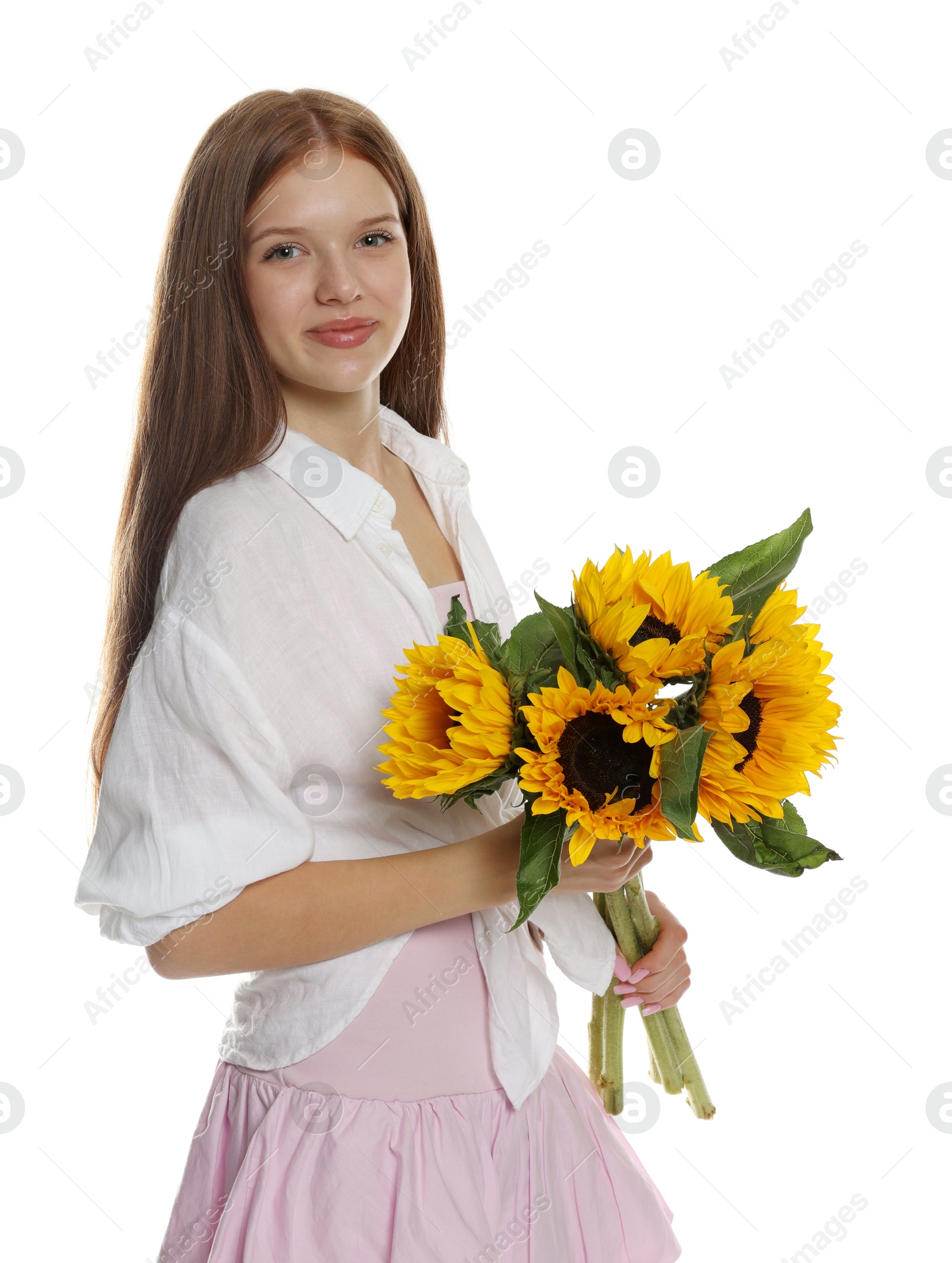 Photo of Teenage girl with bouquet of beautiful sunflowers on white background