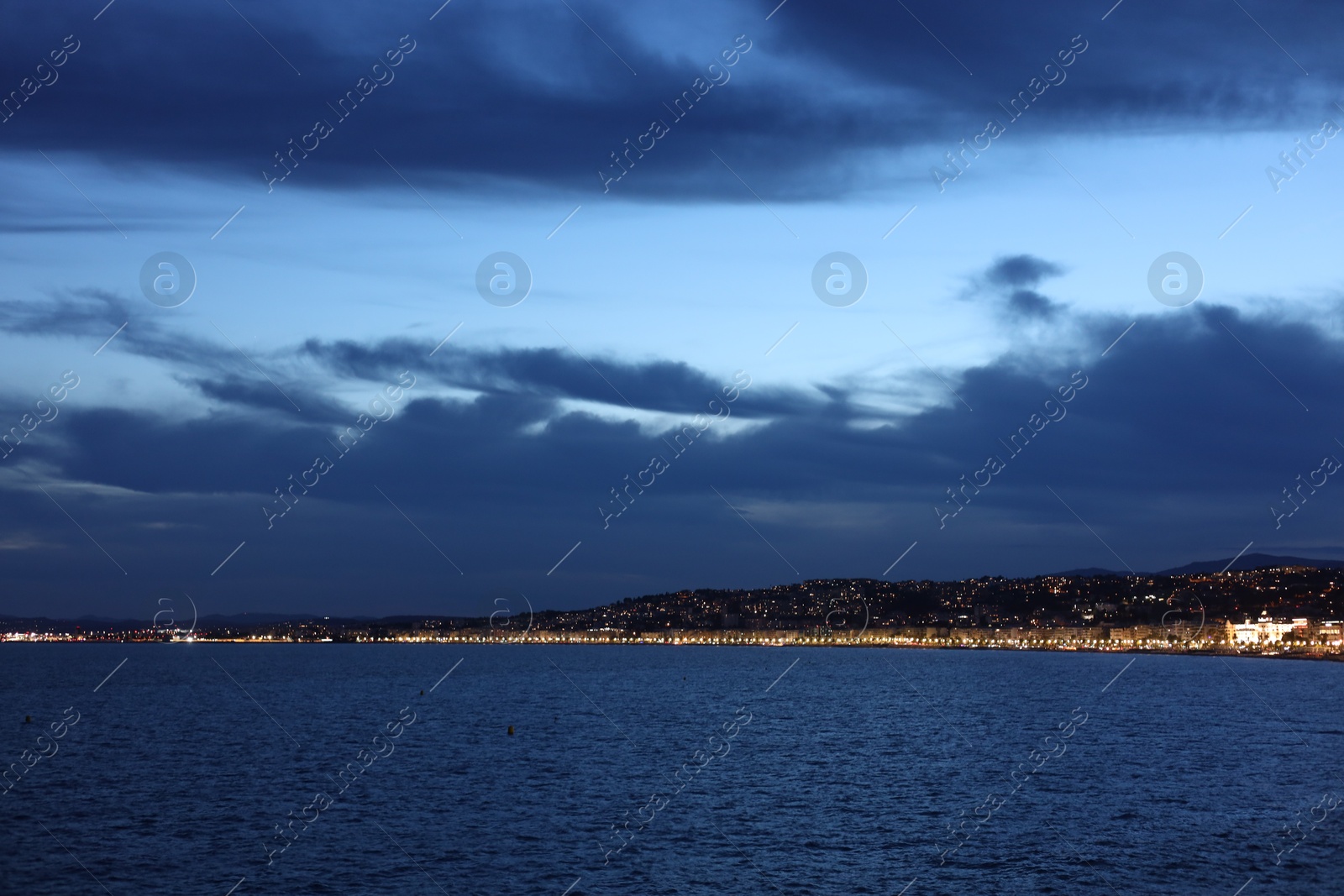 Photo of Beautiful view of coastal city in evening