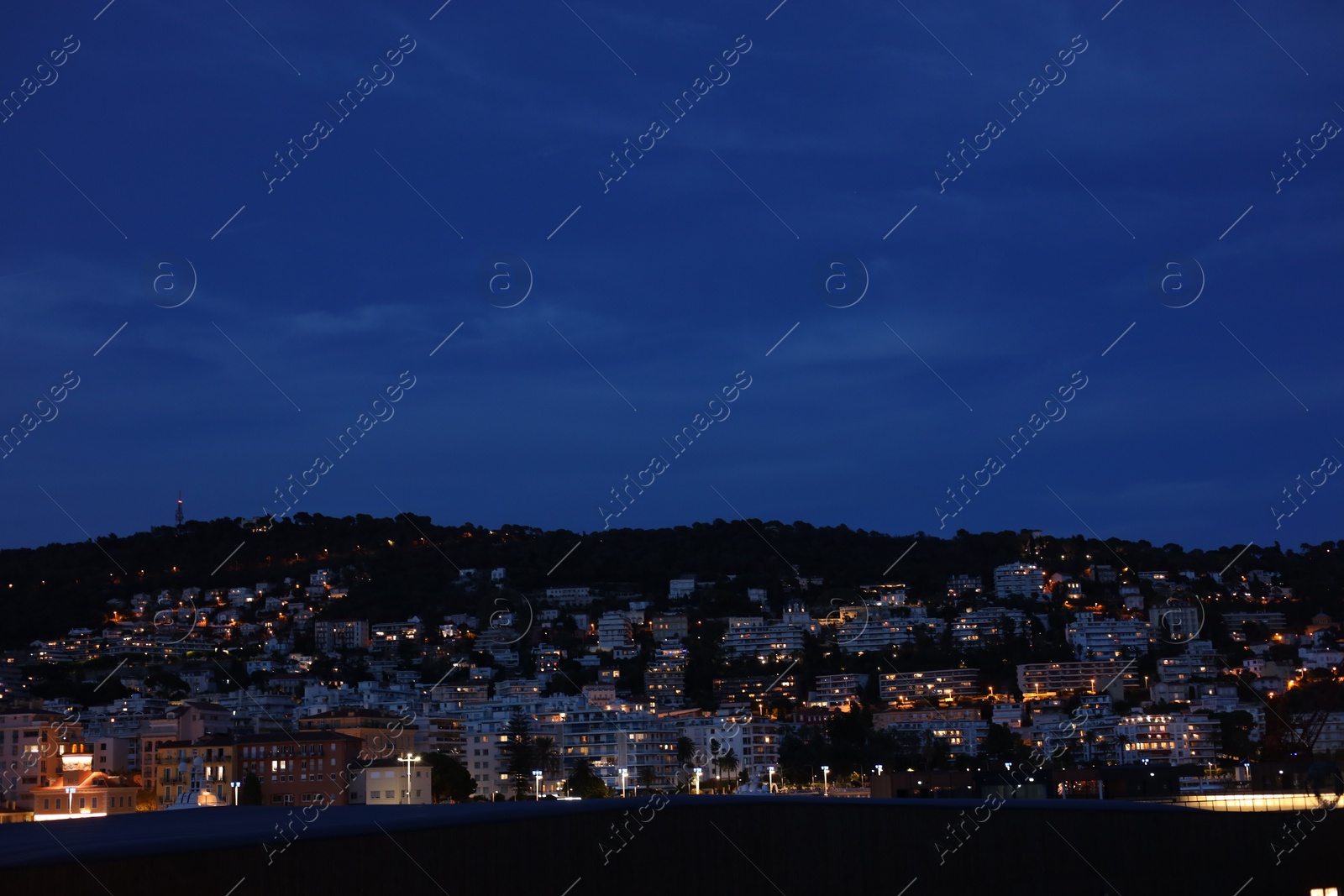 Photo of Beautiful view of coastal city in evening