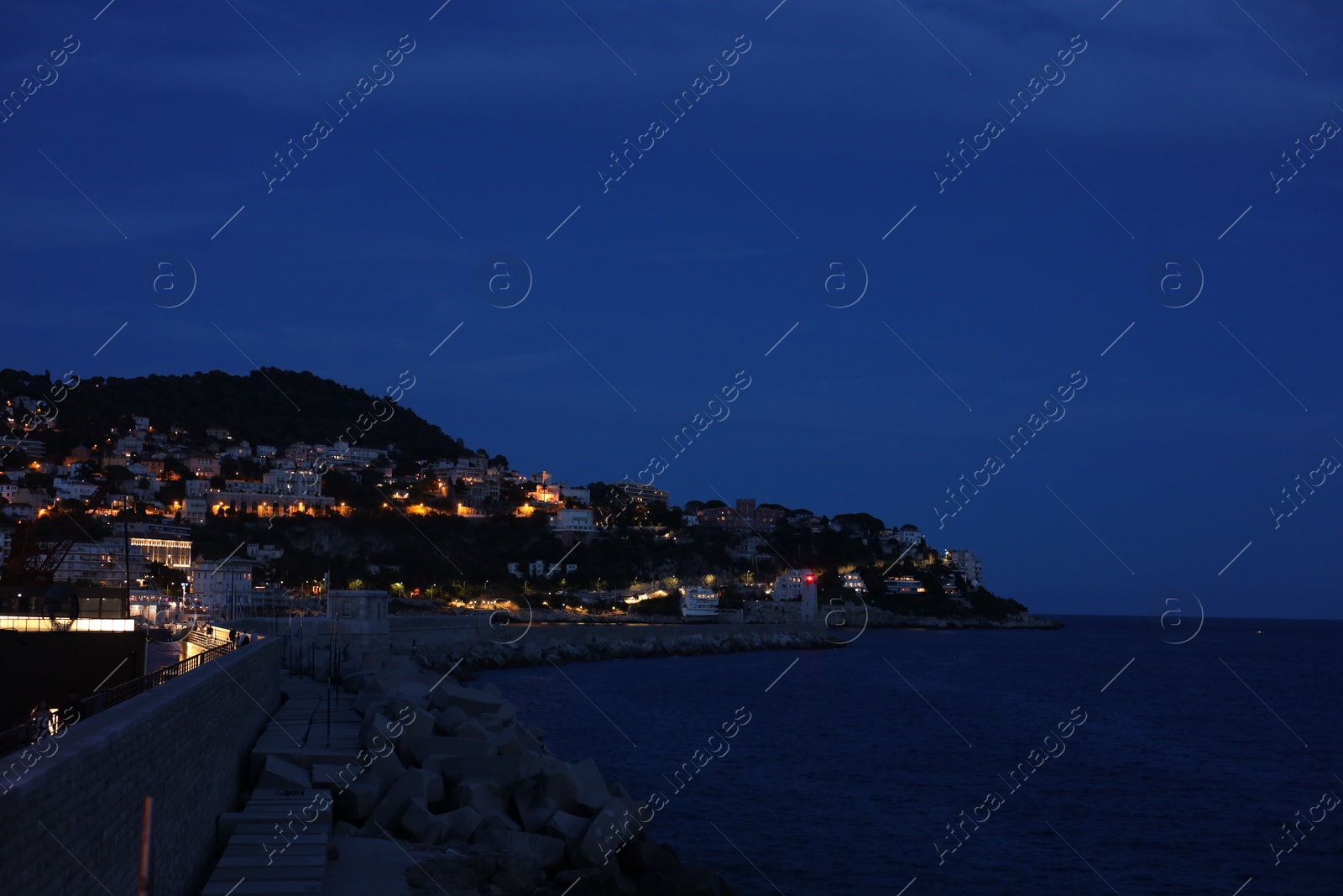 Photo of Beautiful view of coastal city in evening
