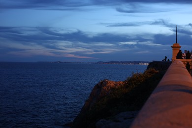 Photo of Beautiful sea in evening, view from city embankment