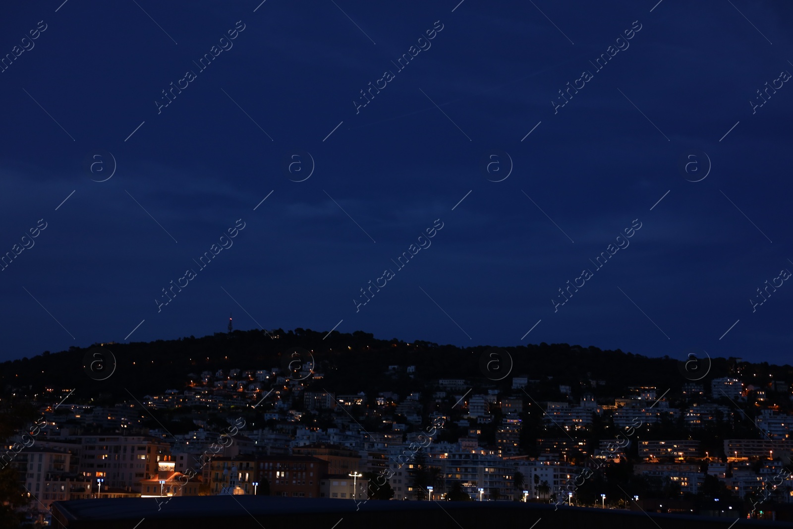 Photo of Beautiful view of coastal city in evening