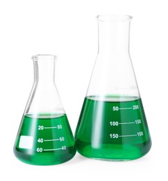 Photo of Glass flasks with green liquid isolated on white