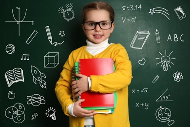 Image of Child wearing eyeglasses near green chalkboard with formulas and drawings