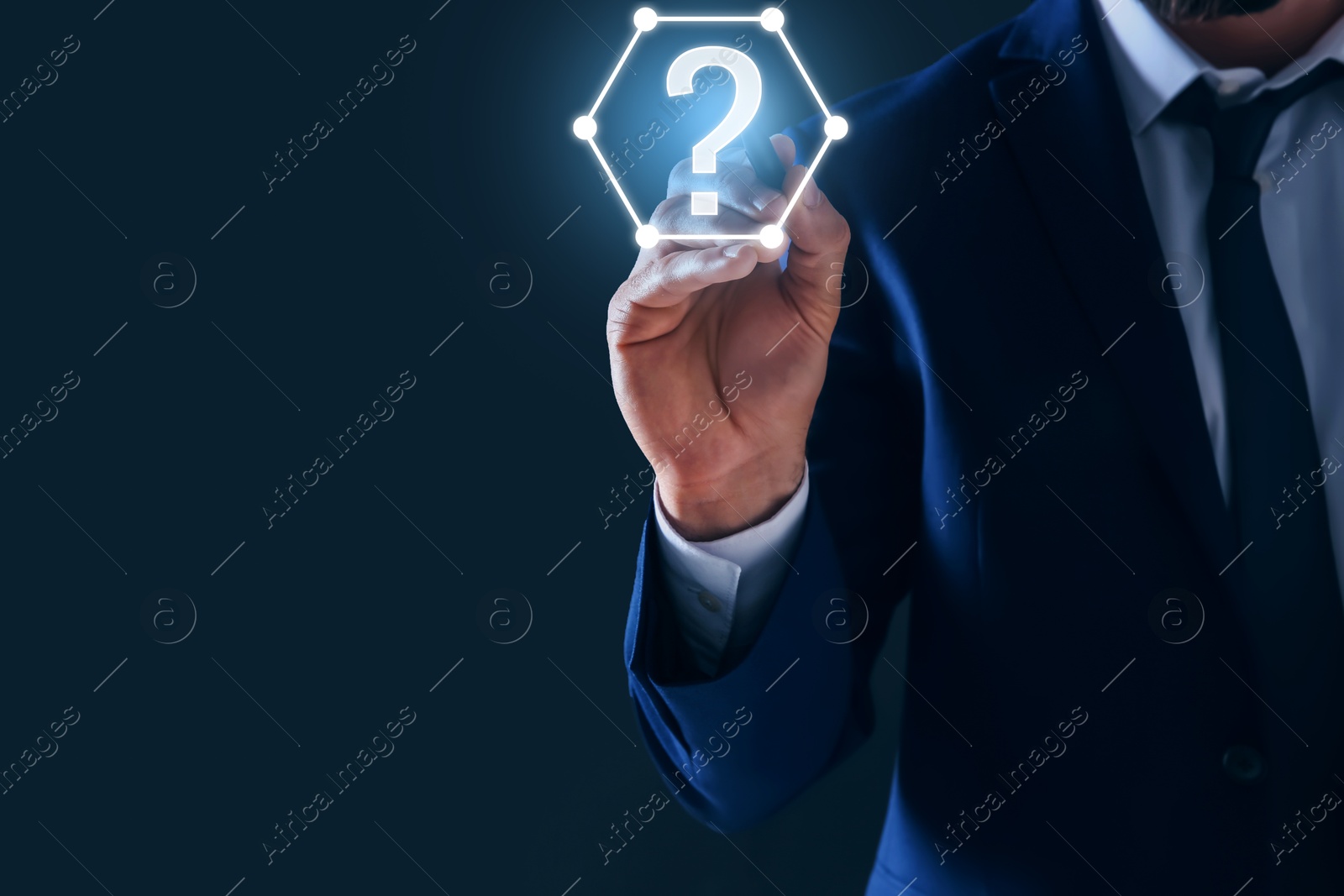 Image of Businessman touching question mark on virtual screen against dark background, closeup