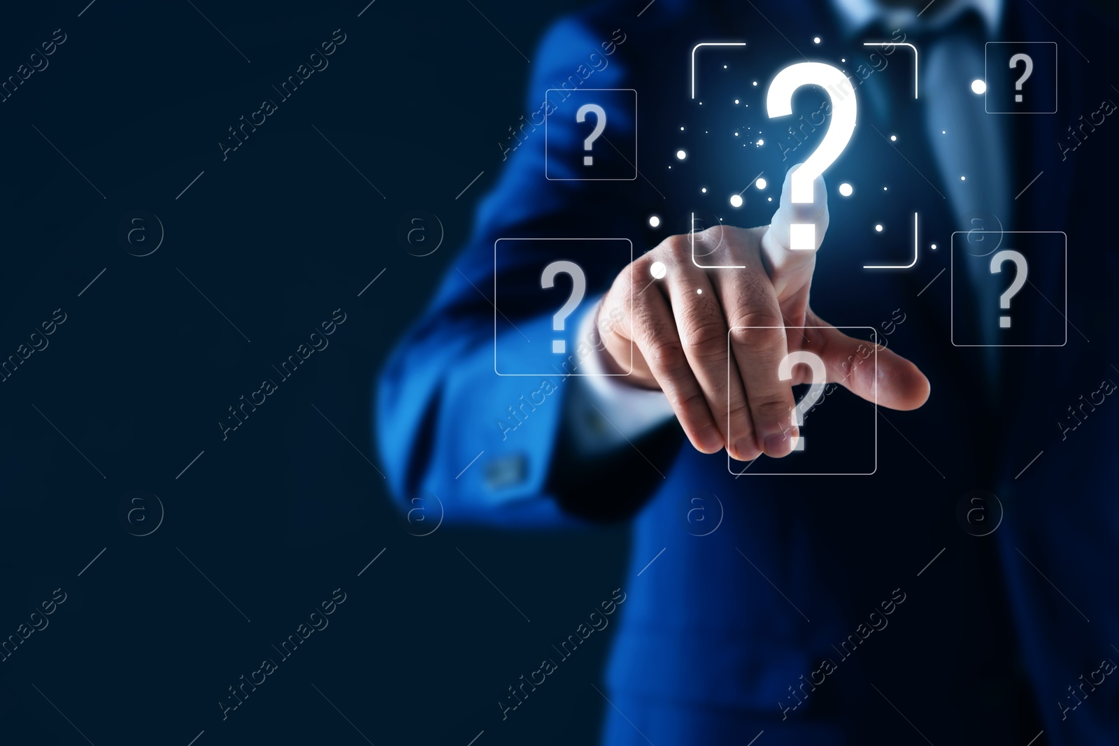 Image of Businessman touching question mark on virtual screen against dark blue background, closeup