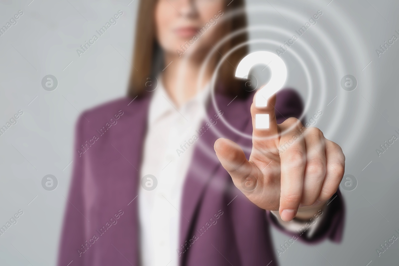 Image of Business woman touching question mark on virtual screen against grey background, closeup