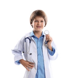 Photo of Choice of profession. Happy little boy in uniform with stethoscope pretending to be doctor on white background