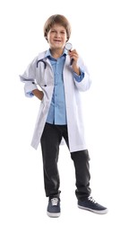 Photo of Choice of profession. Happy little boy in uniform with stethoscope pretending to be doctor on white background