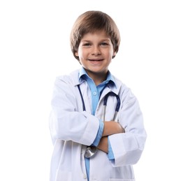 Photo of Choice of profession. Happy little boy in uniform with stethoscope pretending to be doctor on white background
