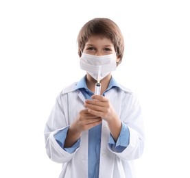 Photo of Choice of profession. Little boy in medical mask with syringe pretending to be doctor on white background