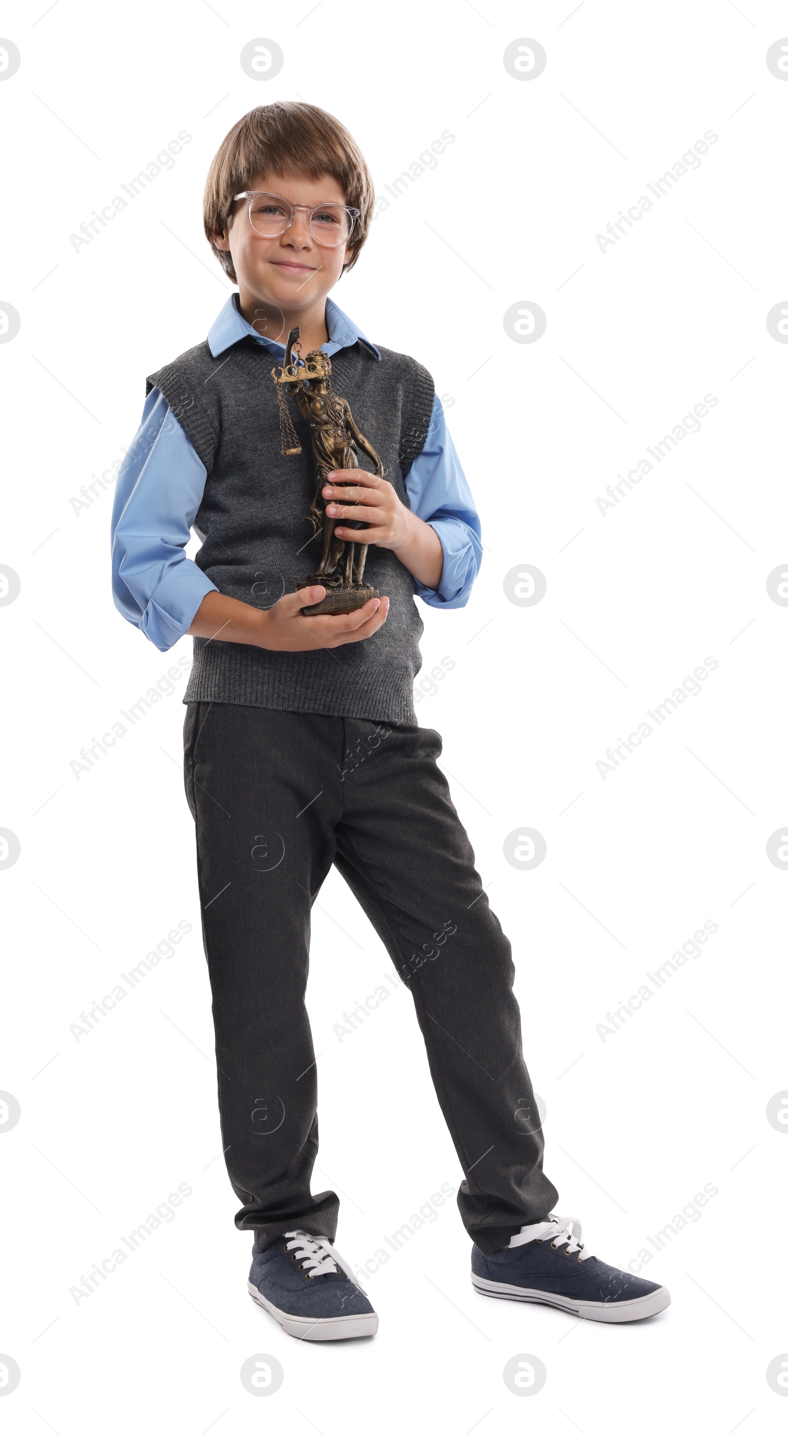 Photo of Choice of profession. Little boy in glasses with statue of Lady Justice pretending to be lawyer on white background