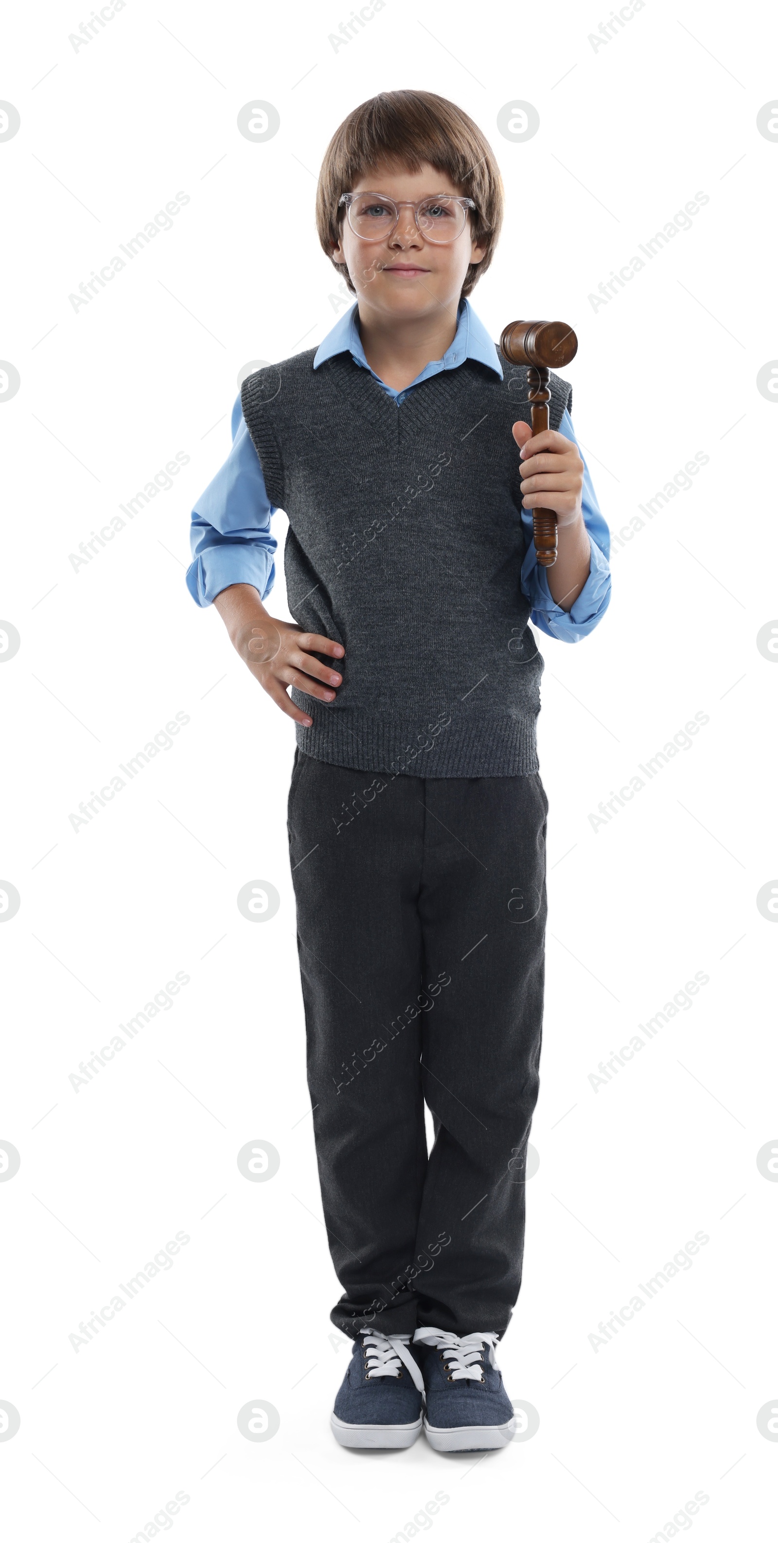 Photo of Choice of profession. Little boy in glasses with judge's gavel pretending to be lawyer on white background