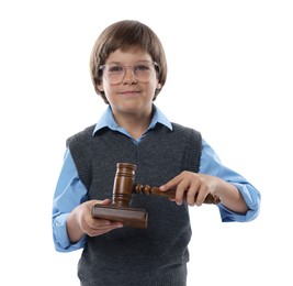 Photo of Choice of profession. Little boy in glasses with judge's gavel and sound block pretending to be lawyer on white background