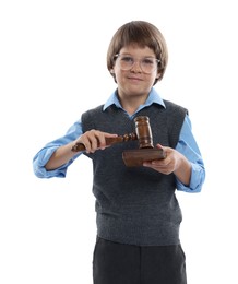 Photo of Choice of profession. Little boy in glasses with judge's gavel and sound block pretending to be lawyer on white background
