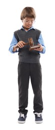 Photo of Choice of profession. Little boy in glasses with judge's gavel and sound block pretending to be lawyer on white background